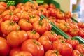 Closeup shot of fresh tomatoes in boxes at a grocery store Royalty Free Stock Photo