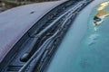 Frozen windscreen and windshield wipers totally covered with ice, caution, poor view causes dangerous driving Royalty Free Stock Photo