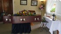 Closeup shot of a funeral casket in a hearse or chapel or burial at cemetery