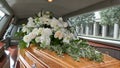 Funeral casket in a hearse or chapel or burial at cemetery