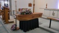 Closeup shot of a funeral casket in a hearse or chapel or burial at cemetery