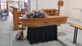 Closeup shot of a funeral casket in a hearse or chapel or burial at cemetery