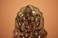 Closeup shot of a golden Ganesha sculpture