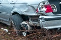 Closeup shot of a gray car wrecked after an accident