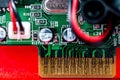Closeup shot of a green electronic circuit board with its small details Royalty Free Stock Photo