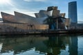 A closeup shot of Guggenheim Museum with Maman spider statue