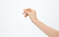 Closeup shot of a hand gesturing snapping isolated on a white background