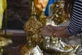 Closeup shot of a hand near a Buddha statue in Wat Yai Chaimongkol temple in Ayutthaya, Thailand Royalty Free Stock Photo