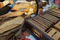 Closeup shot of handmade freshly rolled cigars in a box Royalty Free Stock Photo