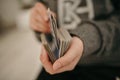 Closeup shot of hands holding playing cards Royalty Free Stock Photo