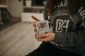 Closeup shot of hands holding playing cards Royalty Free Stock Photo