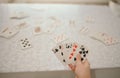 Closeup shot of hands holding playing cards Royalty Free Stock Photo