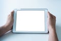 Closeup shot of hands holding tablet, Empty display device. with clipping path