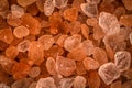 Closeup shot of a heap of pink orange stone crystals