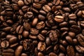 Closeup shot of a heap of roasted brown coffee beans Royalty Free Stock Photo