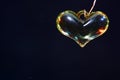 Closeup shot of the heart-shaped yellow bead