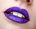 Woman with violet lips makeup