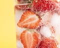 Closeup shot of iced strawberries in a glass Royalty Free Stock Photo