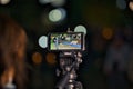 Closeup shot of the iPhone live streaming with bokeh background