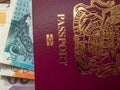 Closeup shot of The Isle of Man British passport  with paper money inside Royalty Free Stock Photo