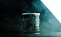 Closeup shot of a korean potato snack against dark background with smoke