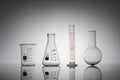 Closeup shot of laboratory flasks, beaker, and tube Royalty Free Stock Photo