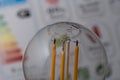 Closeup shot of a LED filament bulb against a blurry background Royalty Free Stock Photo