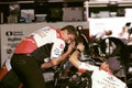 Closeup shot of Long Beach Grand Prix mechanic working on the car