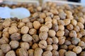 Closeup shot of a lot of walnuts in a food market Royalty Free Stock Photo