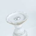 Closeup shot of a luxurious candlestick on a white background