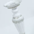 Closeup shot of a luxurious candlestick on a white background