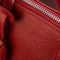 Closeup shot of a luxury red leather bag Royalty Free Stock Photo