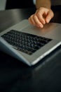 Closeup shot of male hand on touchpad of laptop Royalty Free Stock Photo