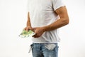 Closeup shot of a male holding a bunch of 100 Euro bills on a white background Royalty Free Stock Photo