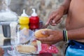 Closeup shot of a male making hamburger