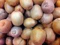 Closeup shot of many kiwi fruits