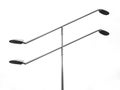 Closeup shot of metal lighting poles isolated on a white background