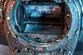 Closeup shot of a mirror box of a camera covered by water drops Royalty Free Stock Photo