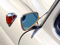 Closeup shot of a mirror of a white car Royalty Free Stock Photo