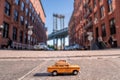 Closeup shot of a model taxi car on Washington Street in Brooklyn, New York, USA