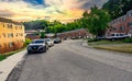 Closeup shot of modern cars near the houses at sunset in Pittsburgh, USA