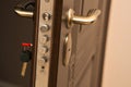 Closeup shot of modern door lock with a key. Empty space Royalty Free Stock Photo