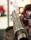Closeup shot of a motorcycle shining metallic cylinder