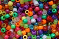 Closeup shot of multi-colored plastic beads for handicraft Royalty Free Stock Photo