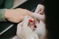 Closeup shot of the nail master working on the client& x27;s nails Royalty Free Stock Photo