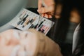 Closeup shot of the nail master working on the client's nails Royalty Free Stock Photo