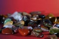 Closeup shot of natural rocks on a red surface