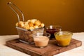 Closeup shot of Noisette potatoes with various sauces shot of Royalty Free Stock Photo