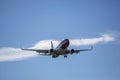 Closeup shot of a Norwegian flight landing at Gardemoen Royalty Free Stock Photo