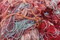 Closeup shot of old red fishing nets in Porto Cesareo, Italy Royalty Free Stock Photo